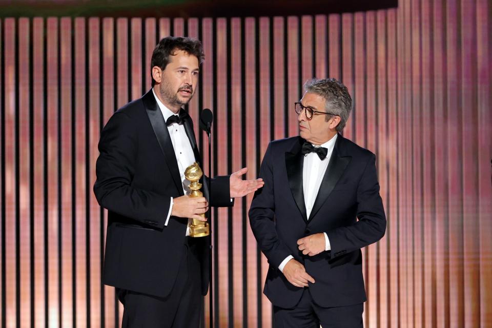 Santiago Mitre and Ricardo Darín accept the Best Non-English Language Film award for "Argentina, 1985".