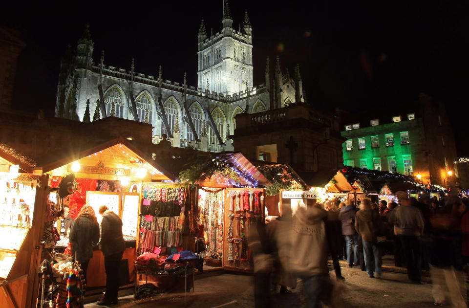 Visitors Enjoy The Stalls As Bath Christmas Market Opens