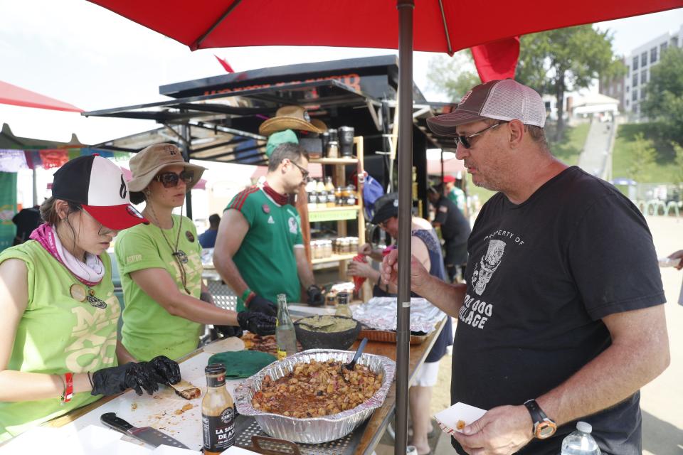 The Mexico BBQ Team serves up tacos on Thursday, May 18, 2023, during the Memphis in May World Championship Barbecue Cooking Contest at Tom Lee Park in Downtown Memphis.