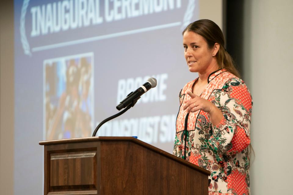 Brooke Sweat, a former FGCU volleyball player and Olympian, gives remarks during the FGCU Athletics Hall of Fame inaugural induction, Friday, Jan. 14, 2022, at the Cohen Student Union in Fort Myers, Fla.