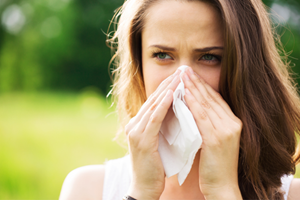 Pollution, climate change, and pollen season combine into a painful summer for spring allergy sufferers.