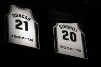 Mar 28, 2019; San Antonio, TX, USA; The jersey of San Antonio Spurs former player Manu Ginobili is unveiled during a jersey retirement ceremony at AT&T Center after a game between the Cleveland Cavaliers and San Antonio Spurs. Mandatory Credit: Soobum Im-USA TODAY Sports