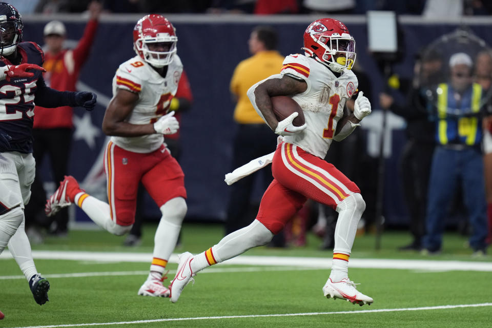 Kansas City Chiefs running back Jerick McKinnon (1) runs for a touchdown against the Houston Texans during overtime in an NFL football game Sunday, Dec. 18, 2022, in Houston. (AP Photo/Eric Christian Smith)