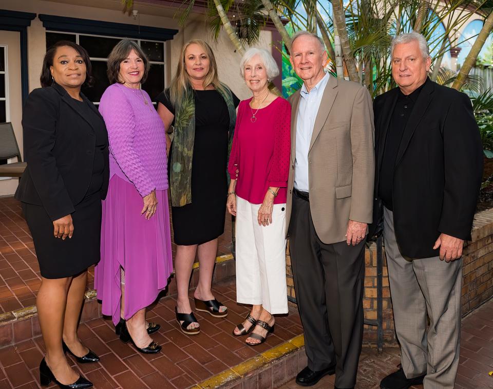 The Safe Children Coalition recently honored four “Champions for Children” at its inaugural Giving Breakfast. From left, SCC vice president Jacqueline House, honoree Michele Grimes, SCC president Brena Slater, and honorees Bobbie and Floyd Price and Rick Oswald.