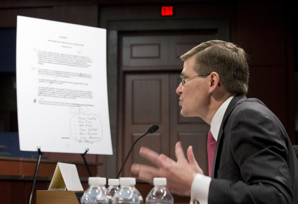 An unclassified talking points document is shown as former CIA Deputy Director Michael Morell  testifies on Capitol Hill in Washington on April 2, 2014, before the House Intelligence Committee.  Morell, who edited the widely debunked talking points on the 2012 Benghazi attack, answered questions from the House intelligence committee in a rare open session. The hearing provides Morell with a chance to explain why he deleted references to al-Qaida.  (Manuel Balce Ceneta/AP)