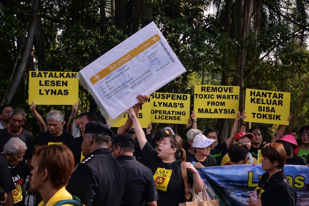 Anti-Lynas demonstrators rally in front of Parliament compound in Kuala Lumpur April 10, 2019. — Picture by Shafwan Zaidon