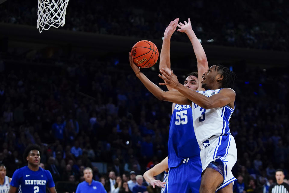 Duke's Jeremy Roach (3) drives past Kentucky's Lance Ware (55) during the first half of an NCAA college basketball game Tuesday, Nov. 9, 2021, in New York. (AP Photo/Frank Franklin II)