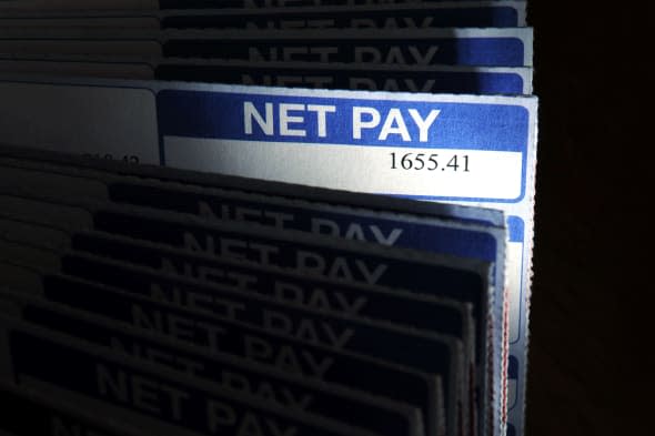 B5JGTP BRITISH MONTHLY PAY SLIPS SHOWING NET PAY AMOUNT.. Image shot 2008. Exact date unknown.  net; pay; payslip; wage; wages;