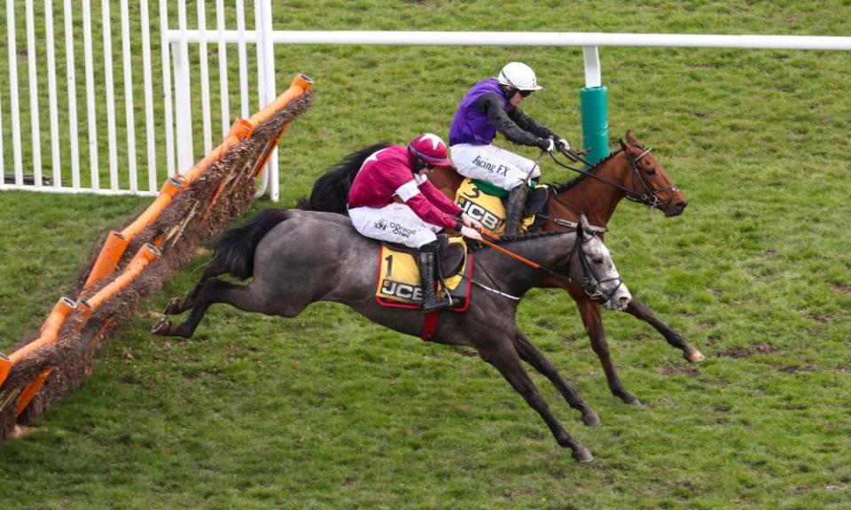 The Willie Mullins-trained Mr Adjudicator (left) and Gordon Elliot’s Farclas battle it out in the JCB Triumph Hurdle at Cheltenham.