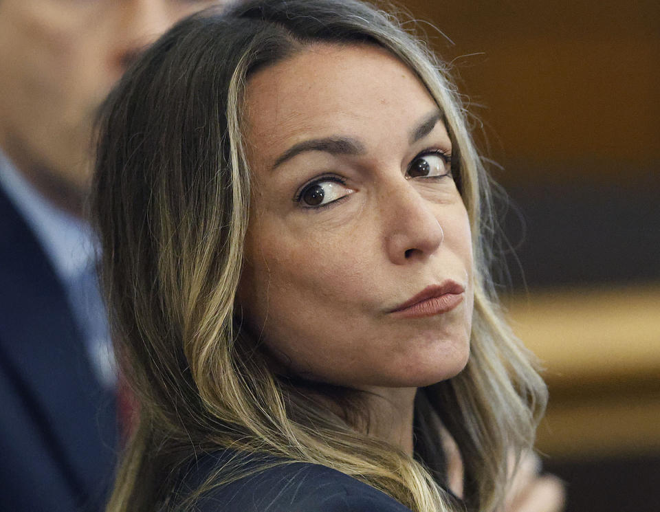 Defendant Karen Read listens to her lawyer Alan Jackson question witness Massachusetts State trooper Michael Proctor during her, Wednesday, June 12, 2024, in Norfolk Super Court in Dedham, Mass. Read is facing charges, including second degree murder, in the 2022 death of her boyfriend Boston Officer John O’Keefe. (Greg Derr/The Patriot Ledger via AP, Pool)