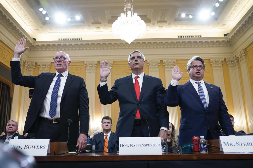FILE - Rusty Bowers, Arizona state House Speaker, from left, Brad Raffensperger, Georgia Secretary of State, and Gabe Sterling, Georgia Deputy Secretary of State, are sworn in to testify as the House select committee investigating the Jan. 6 attack on the U.S. Capitol holds a hearing at the Capitol in Washington, June 21, 2022. The Jan. 6 congressional hearings have paused, at least for now, and Washington is taking stock of what was learned about the actions of Donald Trump and associates surrounding the Capitol attack. (AP Photo/Jacquelyn Martin, File)