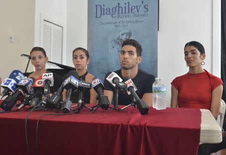 L-R: Lisset Santander, Monica Gomez, Ariel Soto and Yamina Mendez, dancers from the famed National Ballet of Cuba, who defected over the weekend performance in Puerto Rico, hold a news conference in Miami, Florida June 10, 2014. REUTERS/Gaston De Cardenas