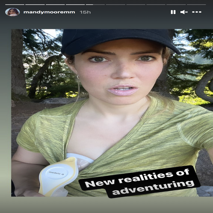 Mandy Moore takes a selfie while pumping breastmilk during a hike