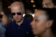 Democratic 2020 U.S. presidential candidate Biden pauses while signing autographs at the Iowa State Fair in Des Moines