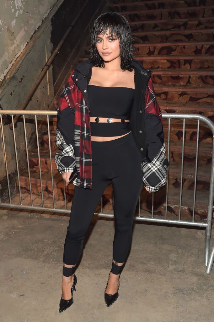 <p>Jenner wore a tartan bomber jacket to the Alexander Wang February 2017 fashion show during New York Fashion Week.</p>