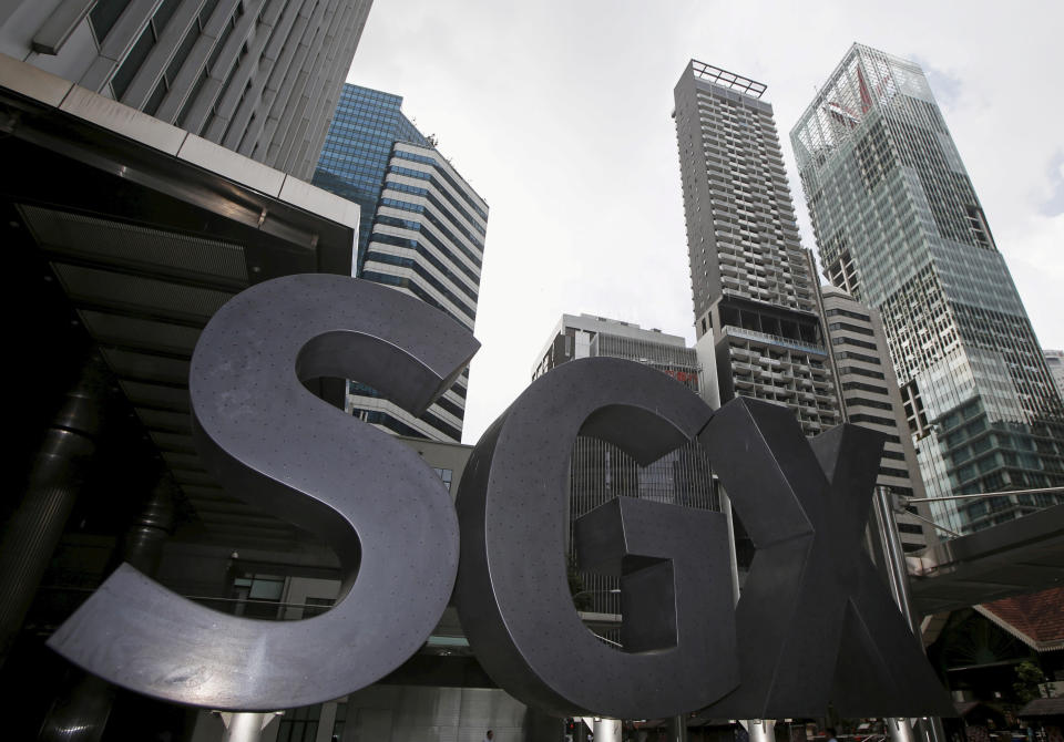 A Singapore Exchange (SGX) sign sits outside its premises at the central business district in Singapore, January 18, 2016. REUTERS/Edgar Su/File Photo