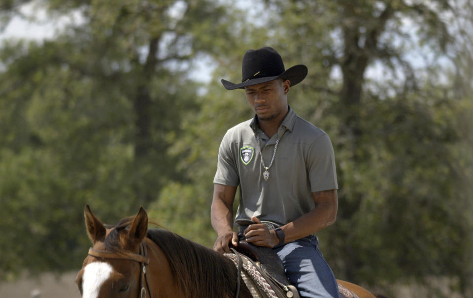 This image released by Amazon Prime Video shows Ezekiel "Zeke" Mitchell in a scene from the series "The Ride." (Amazon Prime Video via AP)