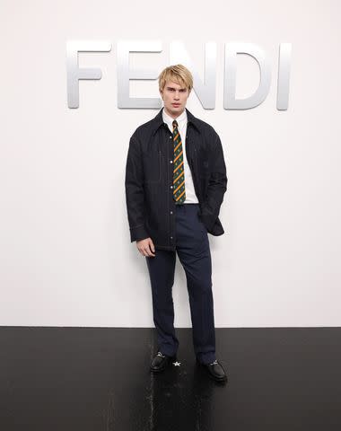 <p>Daniele Venturelli/Getty</p> Nicholas Galitzine rocks his new blonde hair with a preppy menswear look