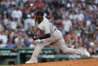 New York Yankees' Domingo German pitches against the Boston Red Sox during the first inning of a baseball game Friday, Aug. 12, 2022, in Boston. (AP Photo/Michael Dwyer)