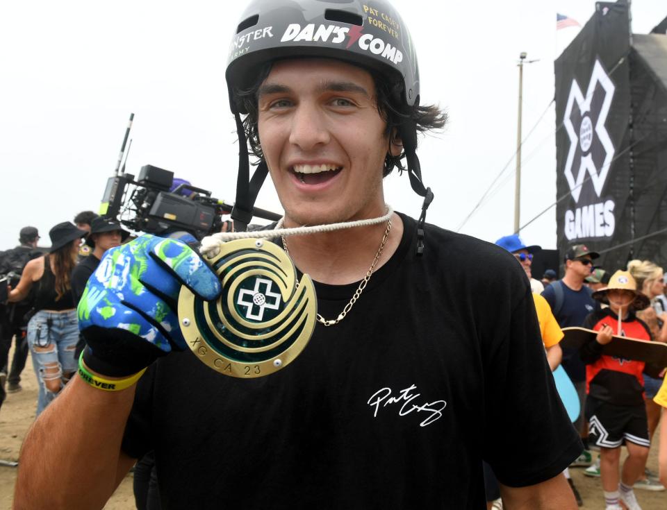 Brady Baker shows off his gold in the BMX Dirt Contest at the X Games competition at the Ventura County Fairgrounds on Saturday, July 22, 2023.