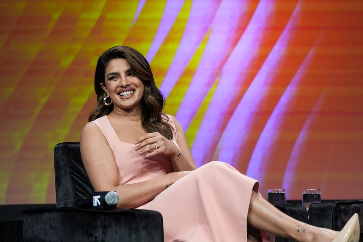 Priyanka Chopra Jonas smiles as she is introduced for her keynote during day one of South by Southwest at the Austin Convention Center Friday, March 10, 2023.