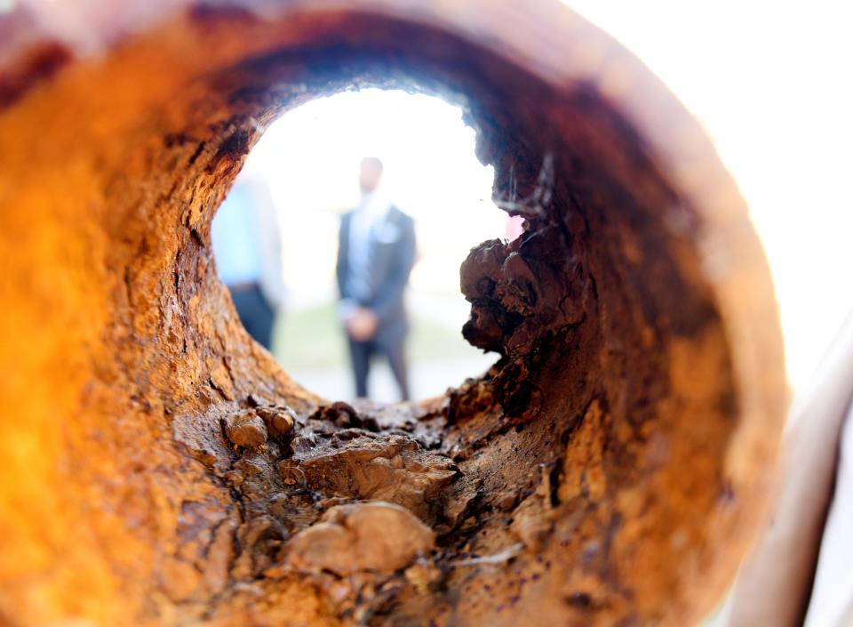 Shreveport Mayor Adrian Perkins visible through a corroded pipe, an issue that would be addressed with the 2021 Bond Proposal on November 24, 2021.