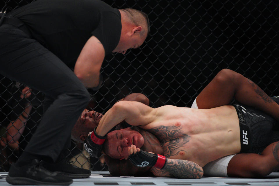 Dec 2, 2023; Austin, Texas, USA; Wellington Turman (red gloves) fights Jared Gooden (blue gloves) during UFC Fight Night at Moody Center. Mandatory Credit: Dustin Safranek-USA TODAY Sports