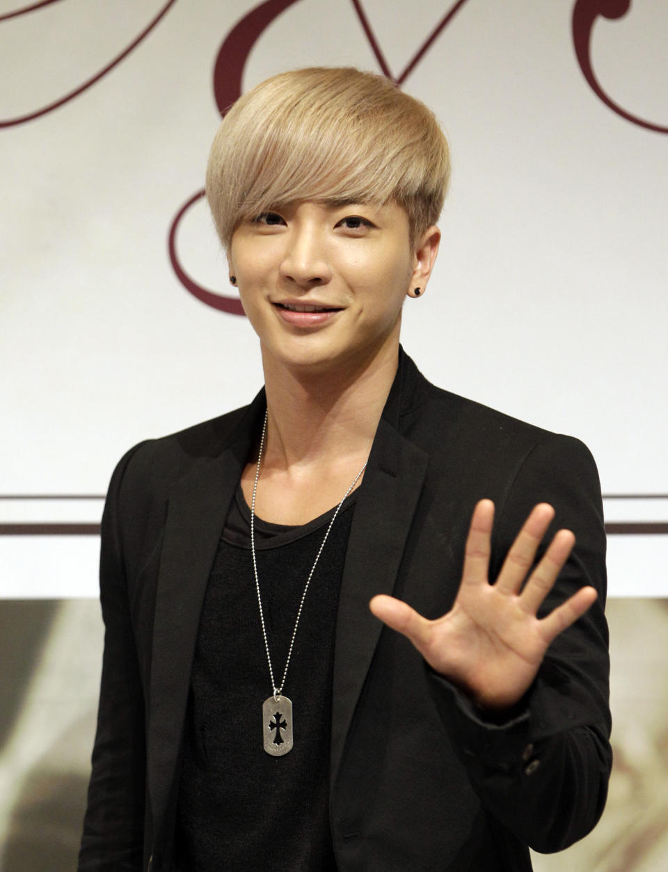 FILE - In this July 3, 2012 file photo, Lee Teuk, a member of South Korean boy band Super Junior, poses for the media after a press conference promoting their 6th album "Sexy, Free & Single" in Seoul, South Korea. The Chosun Ilbo newspaper reported on its website Tuesday, Jan. 7, 2014, Lee's grandparents were found dead in bed while his father was hanging by a rope around his neck at their Seoul home Monday, Jan. 6. His father and grandparents died in a suspected murder-suicide. (AP Photo/Lee Jin-man)