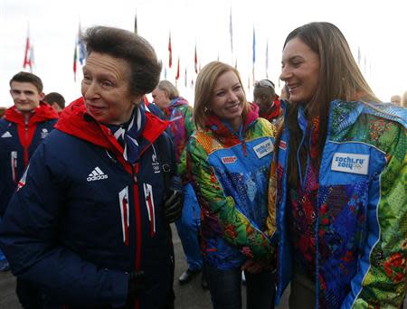 Britan's Princess Anne talks with Russian pole vaulter and Mayor of the Coastal Cluster Olympic Village Yelena Isinbayeva (R), during the welcoming ceremony for the British Olympic team in the Athletes Village at the Olympic Park ahead of the 2014 Winter Olympic Games in Sochi February 6, 2014. REUTERS/Laszlo Balogh