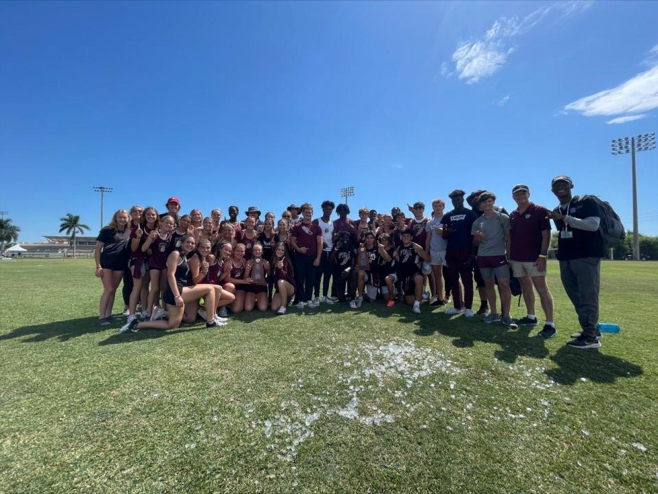 First Baptist Academy boys and girls track team celebrate the Class 1A-12 district championship at the Community School of Naples on Thursday, April 28th, 2022.