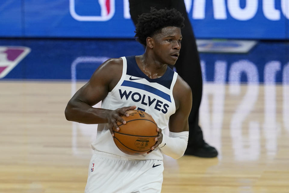 Minnesota Timberwolves guard Anthony Edwards looks to pass the ball against the Golden State Warriors during the first half of an NBA basketball game in San Francisco, Wednesday, Jan. 27, 2021. (AP Photo/Jeff Chiu)