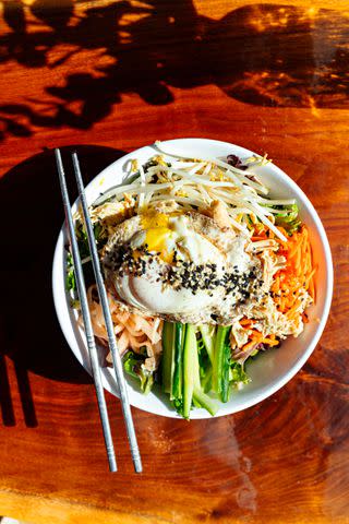 <p>Cedric Angeles</p> Order traditional bibimbap and fusion bites at Mashita.