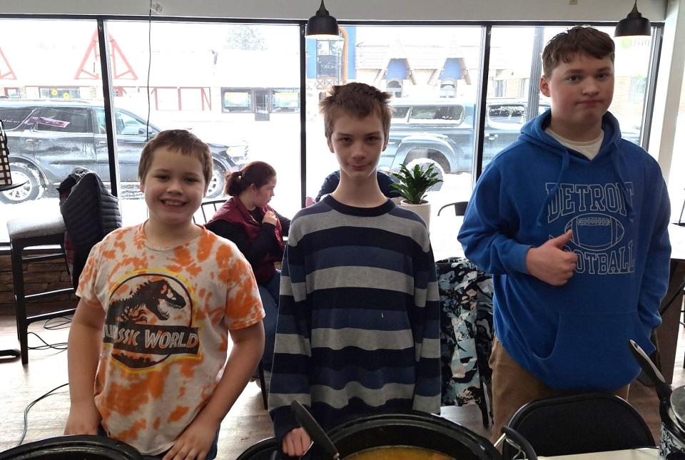 From left, Pierce Rinck, 10, James Massey, 12, and Charles Moody, 13, provided soup at the Alpenfrost Soup Cookoff sponsored by the Kiwanis Club at the North Life Church. Samplers were rewarded with hot, tasty soup after making a donation to the Otsego County Food Pantry.
