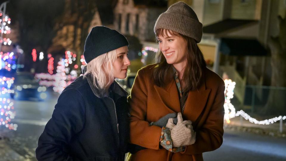 Kristen Stewart and Mackenzie Davis walking in Happiest Season