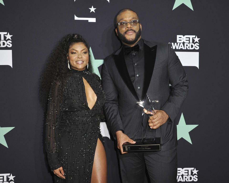 Taraji P. Henson, left, and Tyler Perry, recipient of the ultimate icon award, pose in the press room at the BET Awards on Sunday, June 23, 2019, at the Microsoft Theater in Los Angeles. (Photo by Richard Shotwell/Invision/AP)