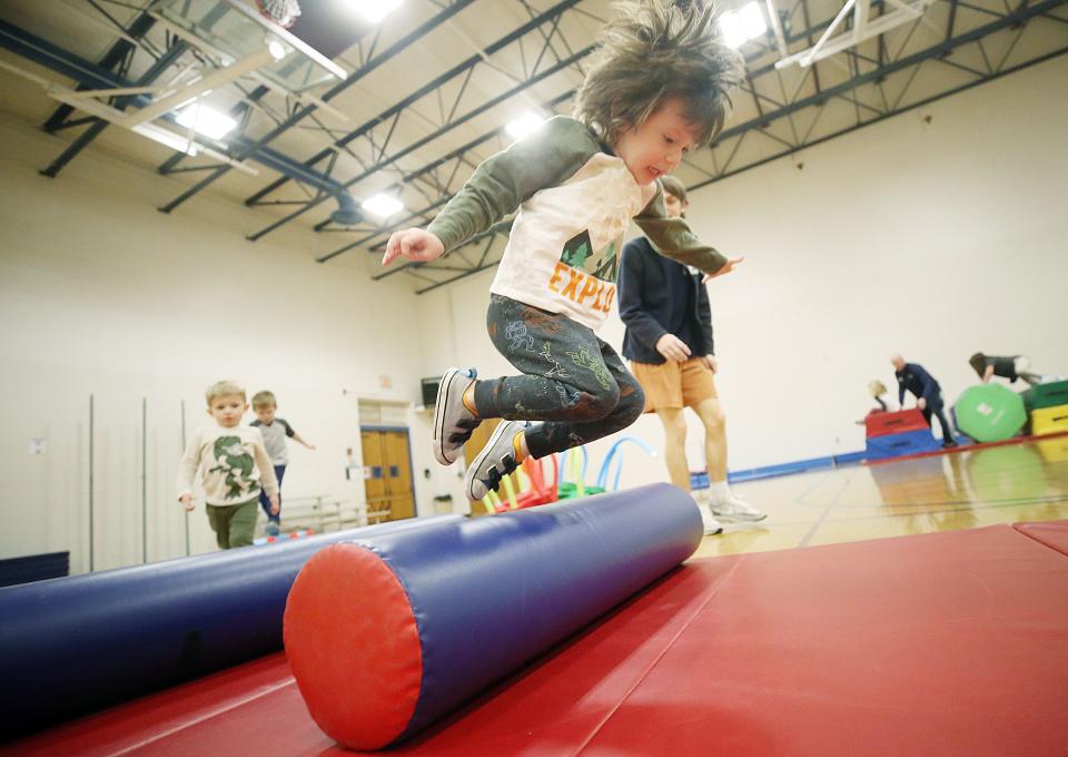 Viggo Muratori, 4, leaps over the obstacles Nov. 17 during the Superhero Training Academy portion of the Superhero Spectacular program at the Worthington Community Center. The Parks & Recreation Department is asking residents to take a survey to help shape future programming.