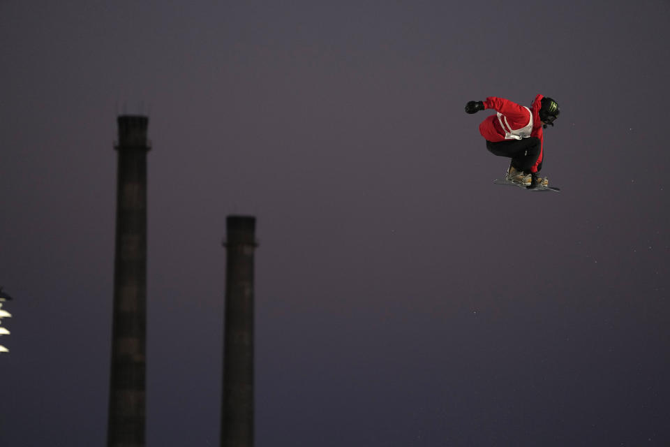 Gold medalist, China's Su Yiming practices for the Men's Snowboard Big Air final during the FIS Snowboard & Freeski World Cup 2024 held in Beijing, Saturday, Dec. 2, 2023. (AP Photo/Ng Han Guan)