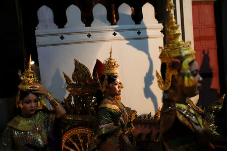 Dancers wait backstage during a performance of masked theatre known as Khon which was recently listed by UNESCO, the United Nations' cultural agency, as an intangible cultural heritage, along with neighbouring Cambodia's version of the dance, known as Lakhon Khol at the Thailand Cultural Centre in Bangkok, Thailand November 7, 2018. REUTERS/Jorge Silva