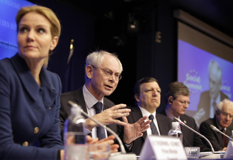 European Council President Herman Van Rompuy, second left, gestures while speaking during a media conference at an EU summit in Brussels on Thursday, March 1, 2012. European leaders meet for a two-day summit aimed at tackling unemployment and boosting economic growth in the region. From left, Denmark's Prime Minister Helle Thorning-Schmidt, European Commission President Jose Manuel Barroso, EU Commissioner for Employment Laszlo Andor and Secretary General of Business Europe Philippe Buck. (AP Photo/Virginia Mayo)