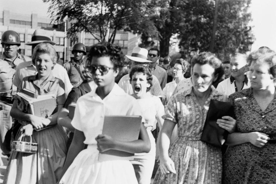 <p>Elizabeth Eckford ignores the hostile screams and stares of fellow students on her first day of school. She was one of the nine Black students whose integration into Little Rock's Central High School was ordered by a Federal Court following legal action by the NAACP.</p>