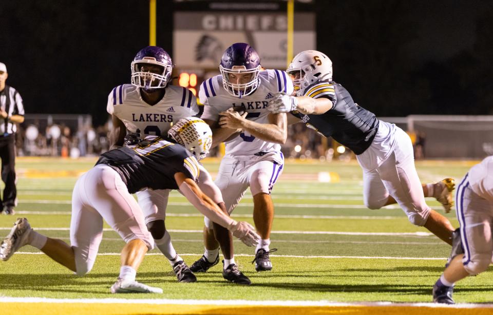 Camdenton QB Bear Shore finds the endzone during the Lakers game at Kickapoo on September 2, 2022.