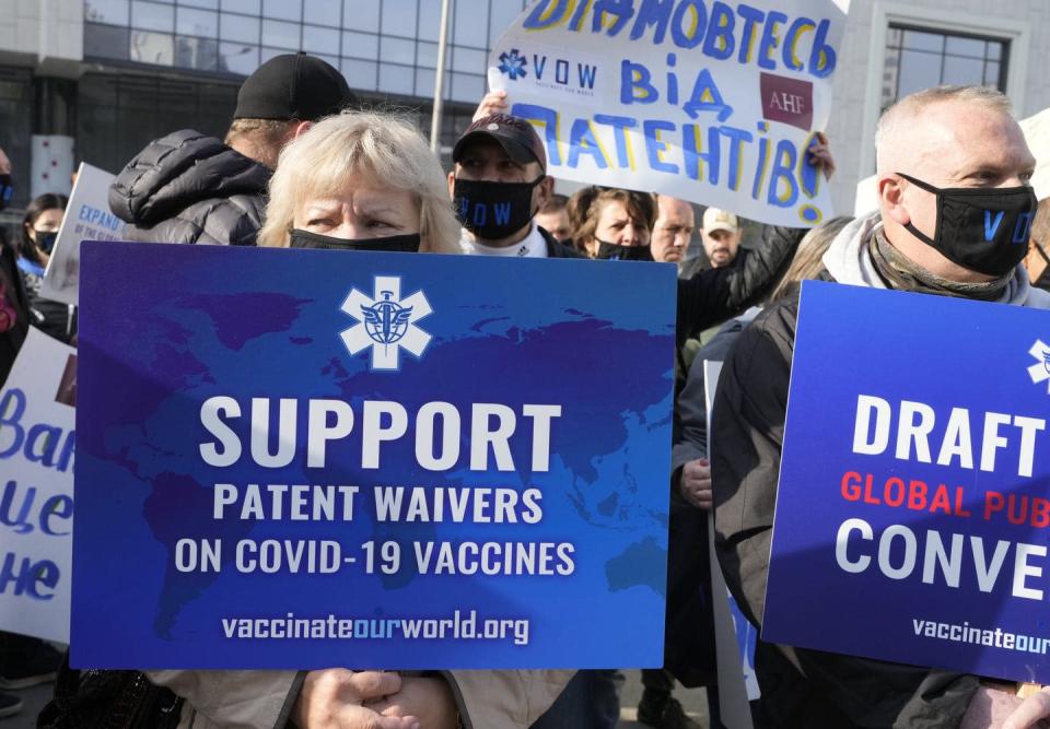 <span class="caption">Activists support patent waivers on COVID-19 vaccines in front of the European Union office during an EU summit in Kyiv, Ukraine, on Oct. 12, 2021.</span> <span class="attribution"><span class="source">(AP Photo/Efrem Lukatsky)</span></span>