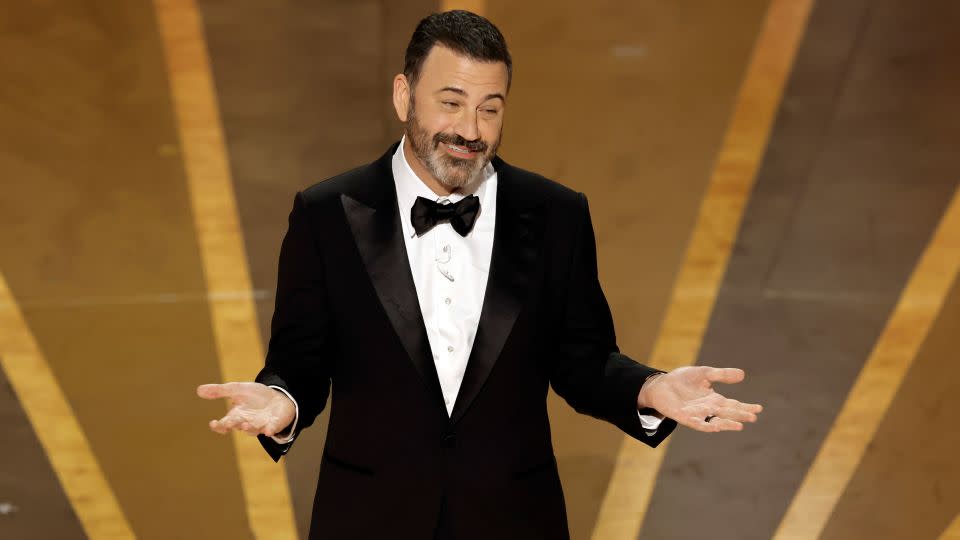 Jimmy Kimmel on stage at the Oscars in 2023. - Kevin Winter/Getty Images
