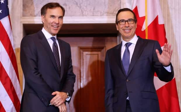 Steven Mnuchin, right, treasury secretary in the Trump administration, and Bill Morneau, who served as Canada's finance minister from 2015 to 2020, were said to have had a good relationship despite tension between Trump and Trudeau.