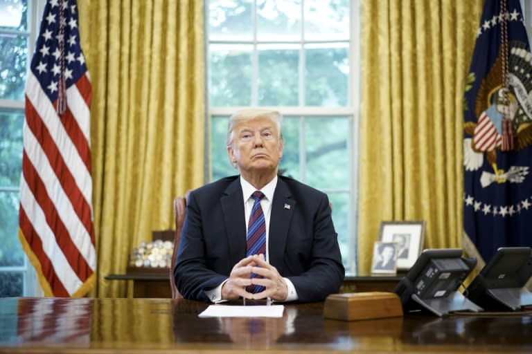 US President Donald Trump, seen here in an August 2018 file photo, is to address the nation from the Oval Office