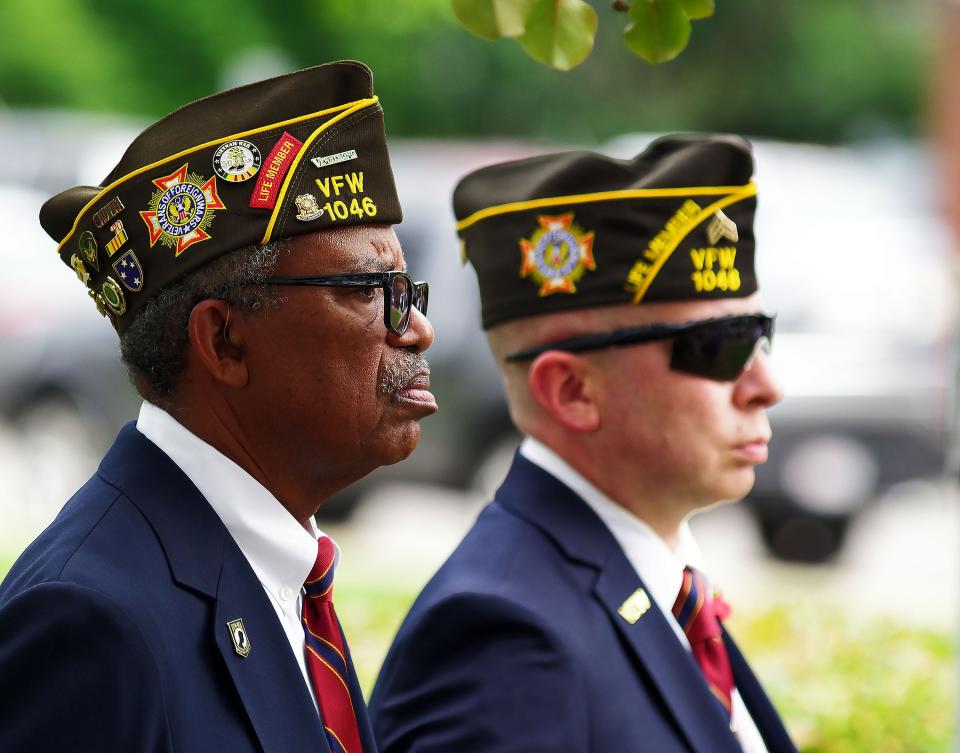 Robert Graham, commander of the VFW Post 1046, and Dennis Diver, Post sergeant at arms, stand in silent tribute to Orleanis William Burton, who was Brockton's first African American serviceman to be killed in action in WW I. His official plaque was rededicated in downtown Brockton on Wednesday, September 7, 2022.