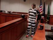 Jennifer Crumbley, the mother of accused Oxford High School gunman Ethan Crumbley, enters the court room during a court procedural hearing in Rochester Hills