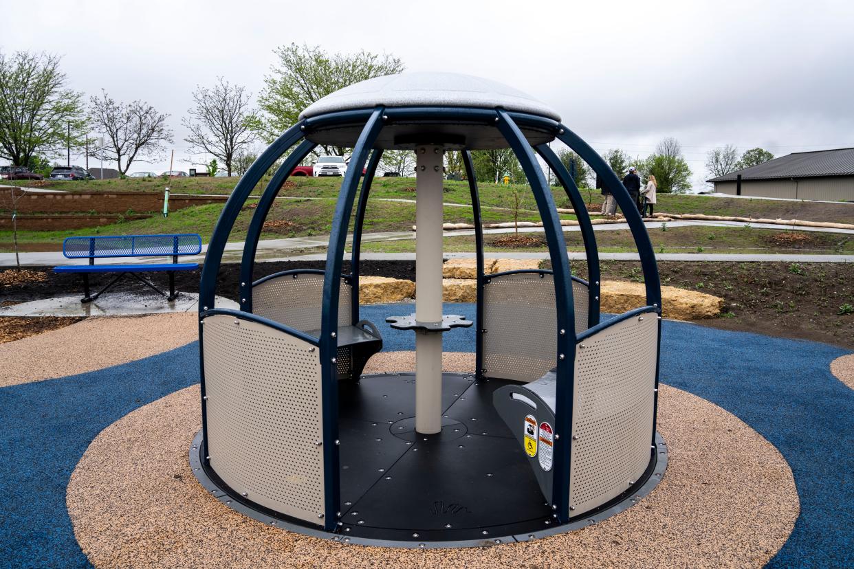 A wheelchair accesible merry-go-round at North Shore Recreation Arena at Easter Lake Park on Thursday, May 2, 2024, in Des Moines.