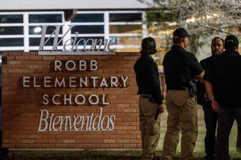 Police officers outside of Robb Elementary School where 21 people were killed on Tuesday. (Getty Images)
