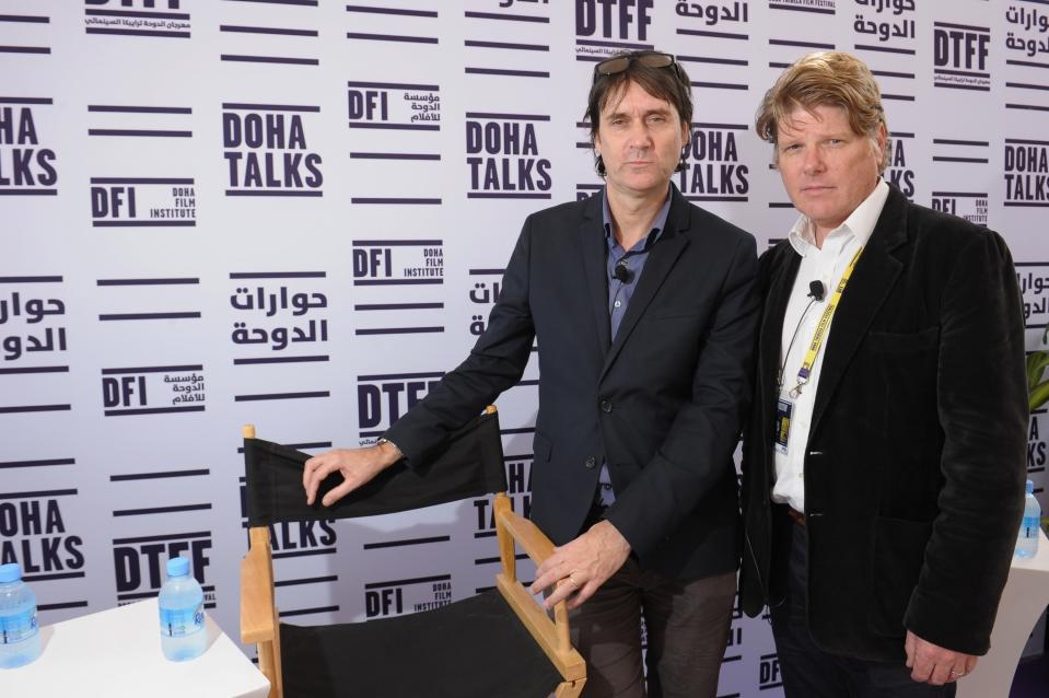 Neal Purvis (L) and Robert Wade speak at the “Masterclass with Neal Purvis and Robert Wade” panel at the Al Mirqab Hotel during the 2012 Doha Tribeca Film Festival on November 19, 2012 in Doha, Qatar. (Photo by Michael Loccisano/Getty Images for Doha Film Institute)